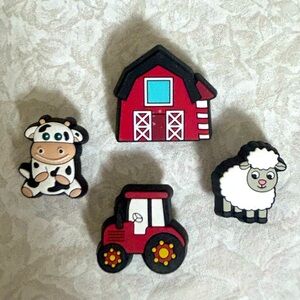 Crocs CUTESEY FARM ANIMAL 4 PACK
Jibbitz Charms Sheep Cow Tractor Barn